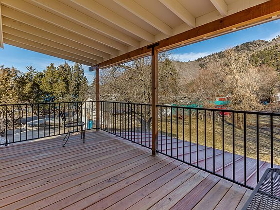 Deck on 2nd level with views to the east and overlooking the backyard.