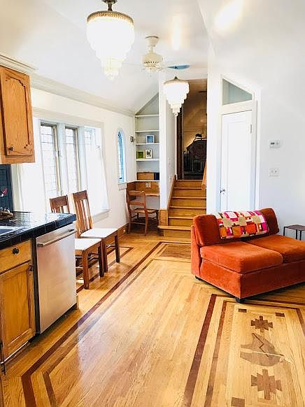 Main living area . Showing the inlay true hard wood floors.