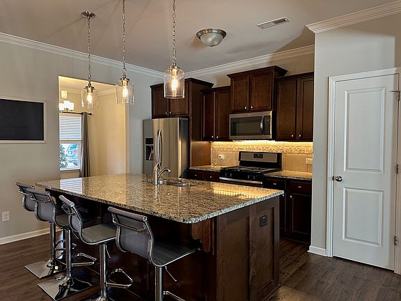 Large kitchen island with barstools