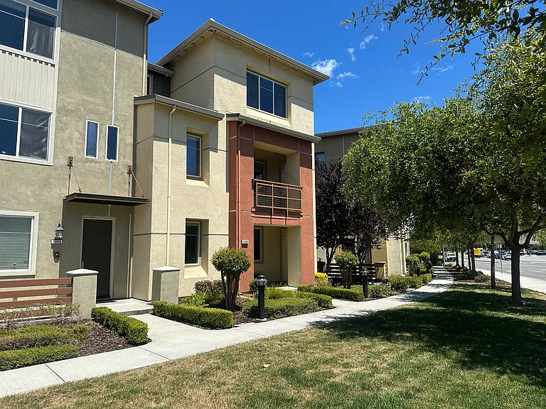 Bright, sunny corner unit with abundant windows and natural light.