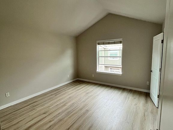 One of two master bedrooms on second floor.
