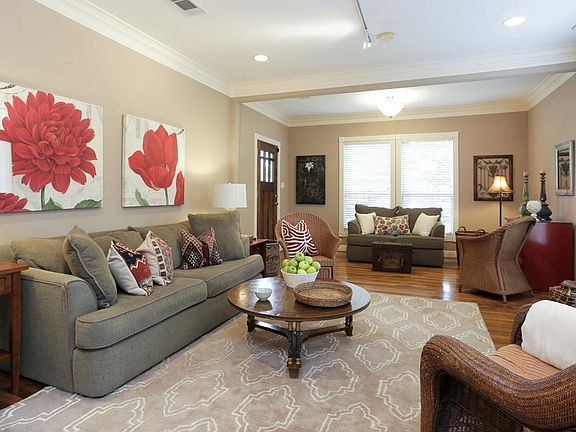 Another view of oversize living room looking towards front door.
