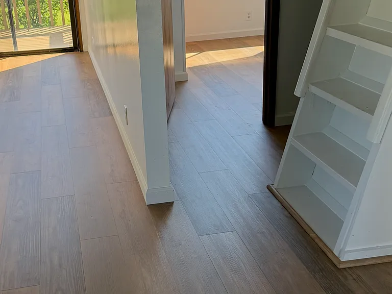 Living Room (left); Bedroom (right) and Ladder to Loft