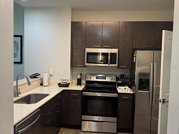 3rd image of 14501 GROVE RESORT AVENUE #3135