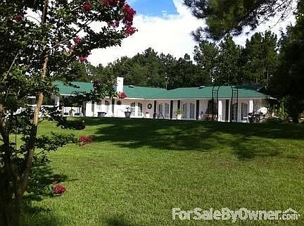 Pool Side
						:
						This home is in a T shape. This is the right side which is also the pool side.