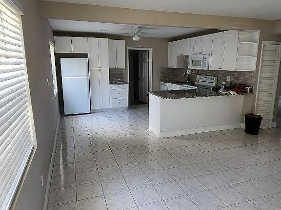 Living room looking into the kitchen, open floor plan
