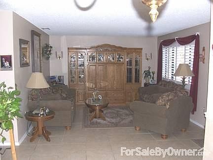 Raised 12 person Jacuzzi
						:
						Jacuzzi spilling into the pool forming one of the six waterfalls.