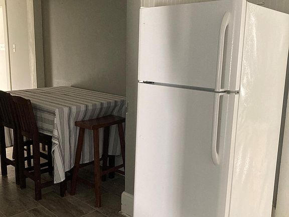 Eat in kitchen with new refrigerator
