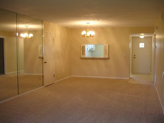 Large living & dining rooms (w/ large storage clst) looking to bright kitchen