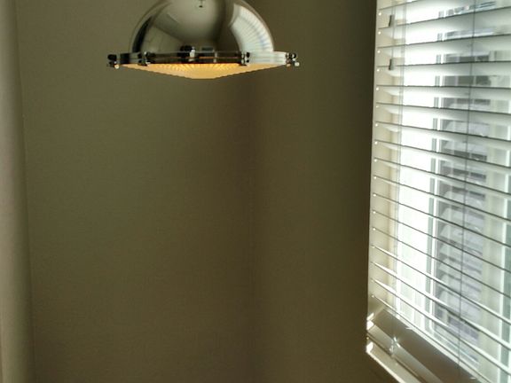 High end light fixcture over stairs