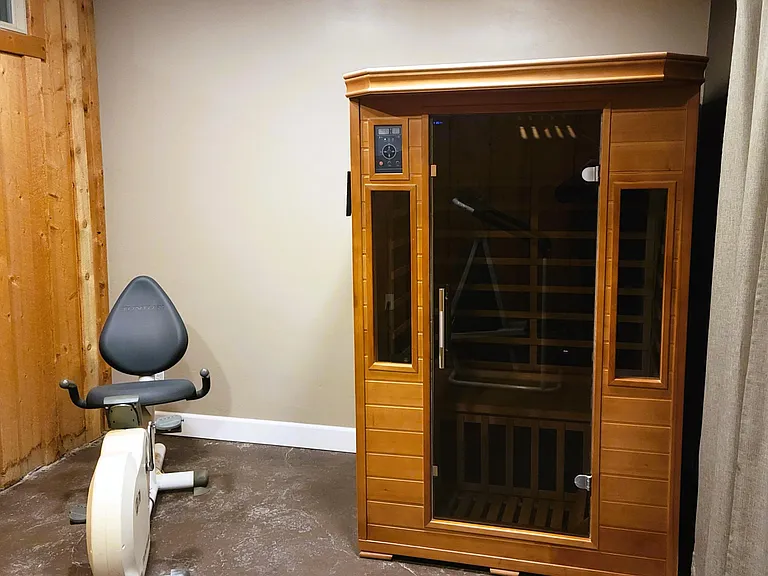 workout room with an infrared 2-person sauna.
