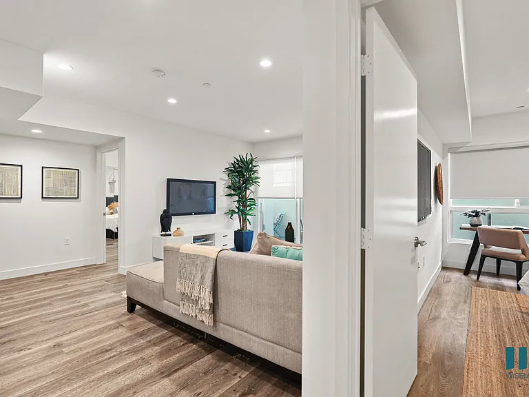 Living Room with Vinyl Flooring and Recessed Lighting