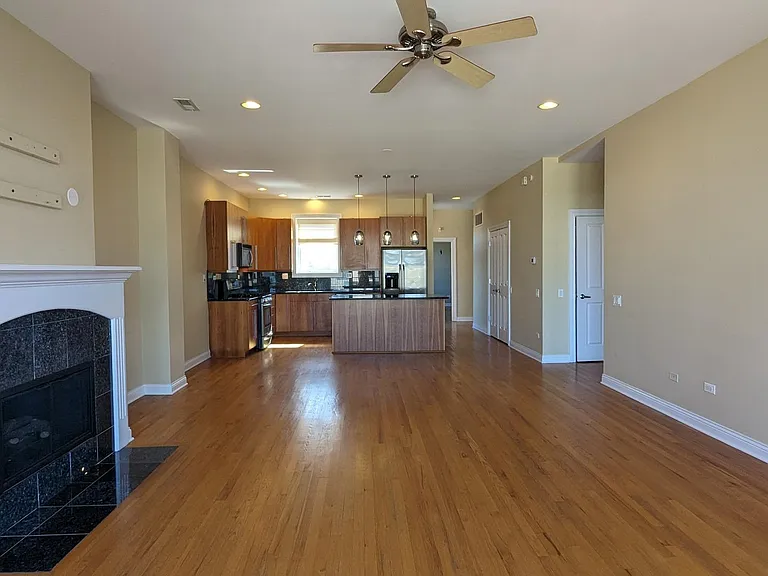 The living areas have been freshly painted in a lighter neutral tone