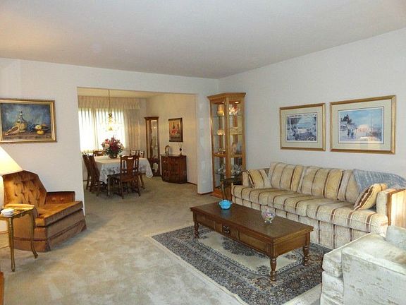 Formal living room with plenty of seating area.
