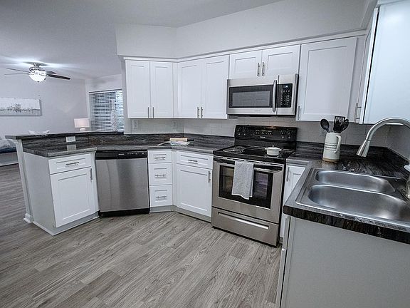 Emerson Isles has two renovated styles of kitchens with an open concept featuring stainless steel appliances and a breakfast bar overlooking the dining and living areas.
