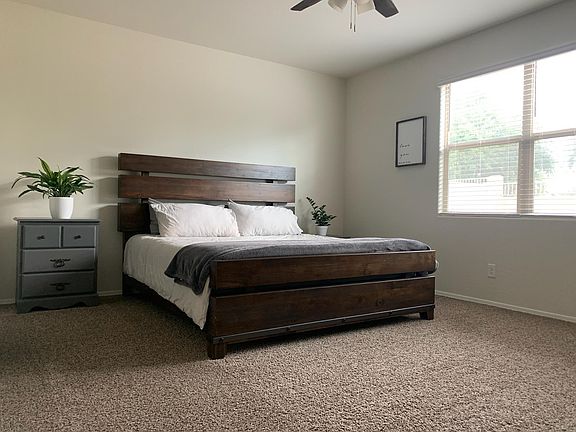 King bed, for illustration purposes, does not come with house.