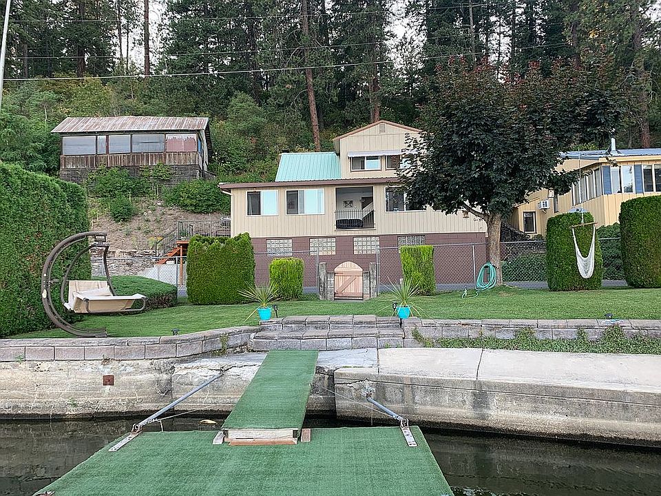 House/outbuilding on left