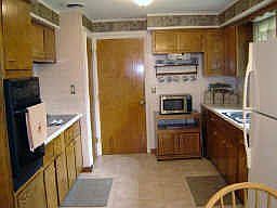 Eat-in kitchen with appliances