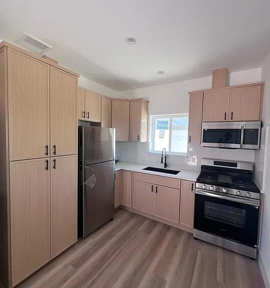 7669 Beeman Ave — Photo 1
