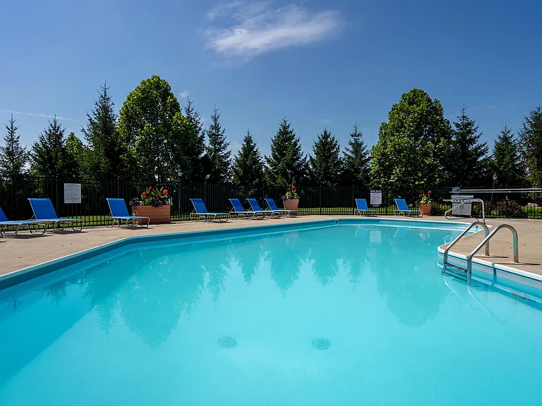 Kick back and unwind poolside with friends.