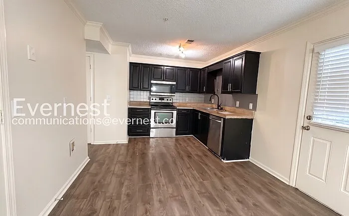 2 bed, 1.5 bath, 1232 sqft, $1,235 — Photo 2