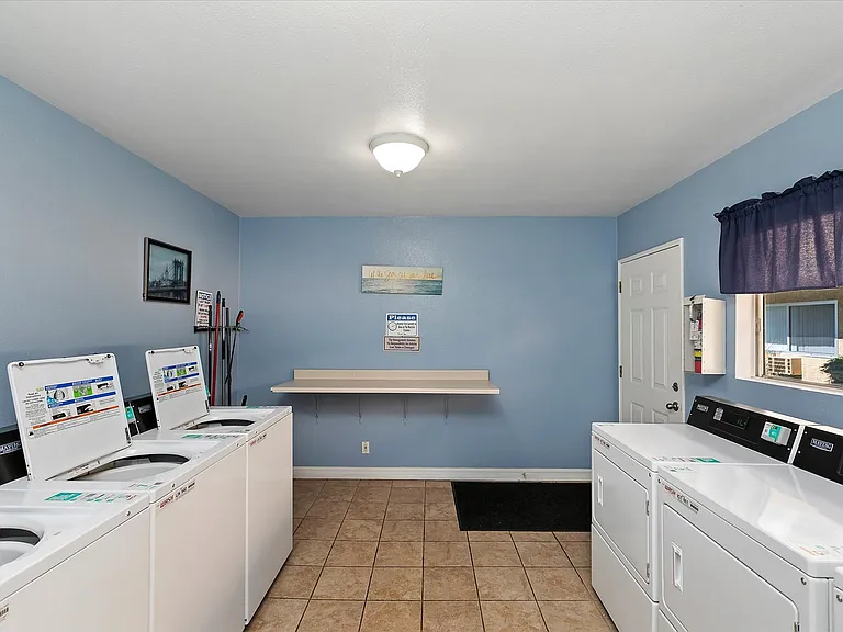 Shared Laundry Room with Convenient Pay through App Feature