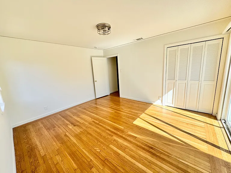 Primary bedroom with closet