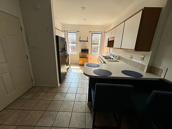 wide open kitchen with excellent appliances