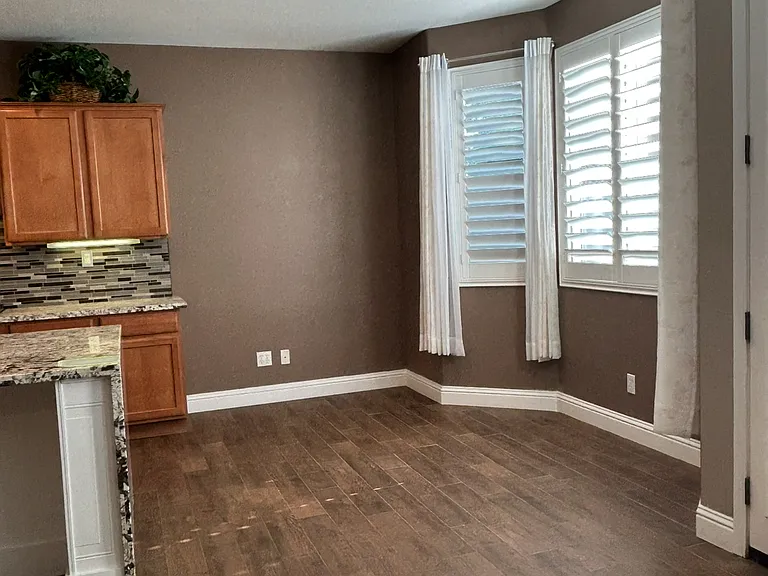 Kitchen nook, overlooking kitchen and family room