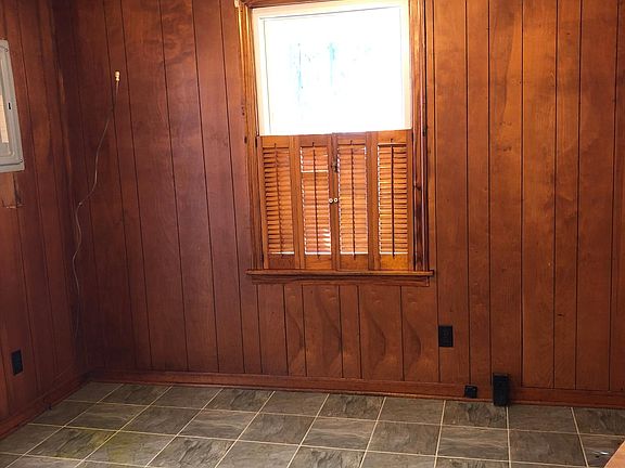 Plenty of room for kitchen table. Space for refrigerator.
