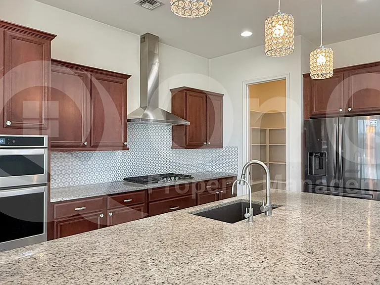 9707 W Patrick Ln — Photo 7