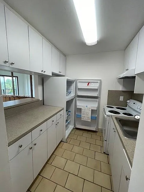 Building Photo - 13455 NE 10th Ave #405