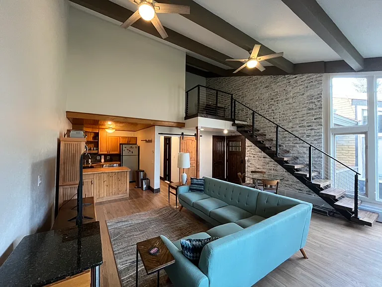 Open floor plan with living, dining space and kitchen.