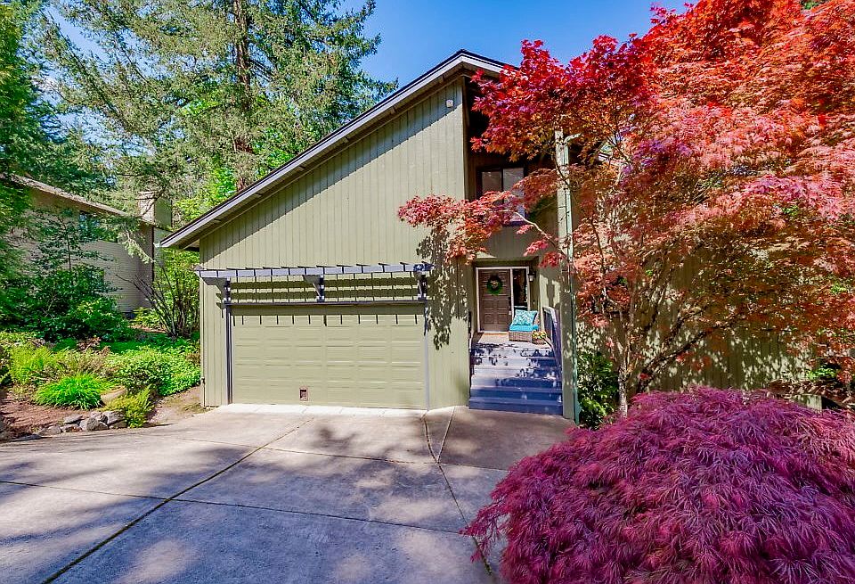front door and 2 car garage