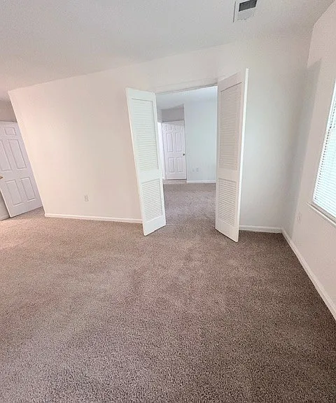 Primary Bedroom into 4th Room