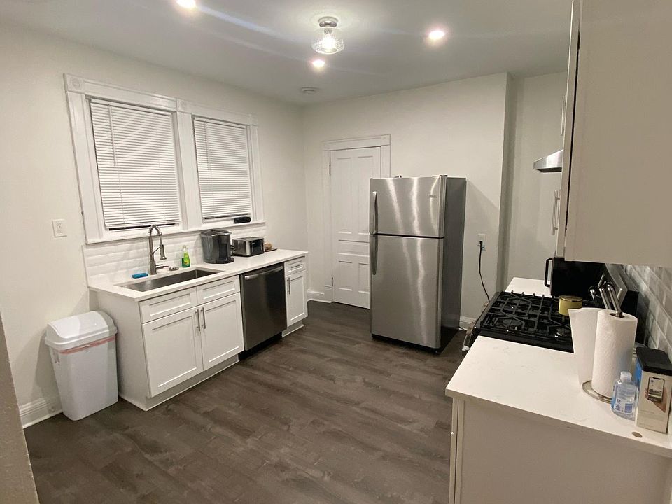 Updated kitchen, including newer appliances, quartz counters, subway tile backsplash