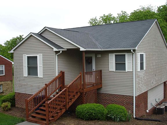 Outside of building, ample parking and lots of green space!