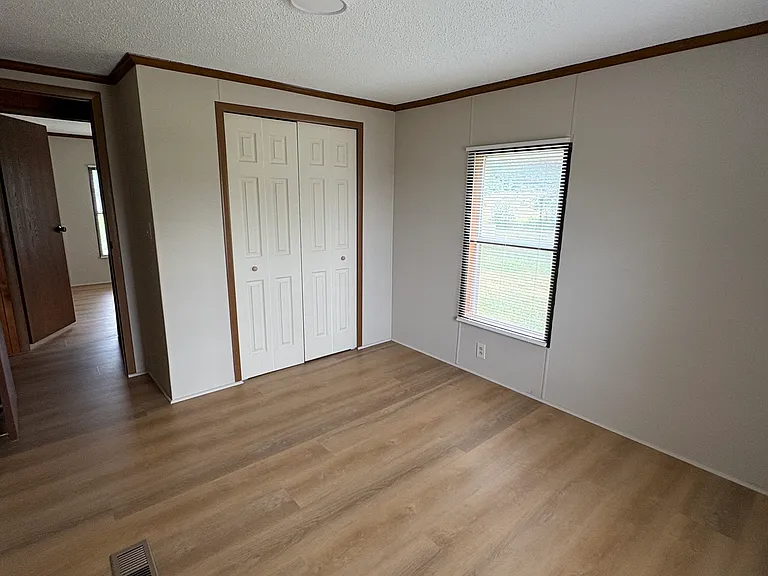 2nd bedroom, across from hallway bathroom