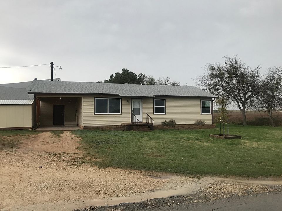 Front view of home/storage shed to the left