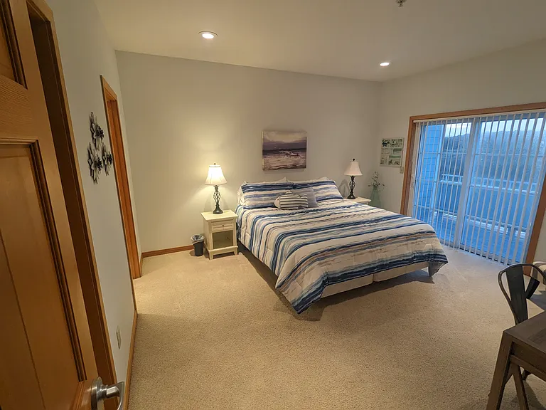 Primary bedroom with comfortable bed.
