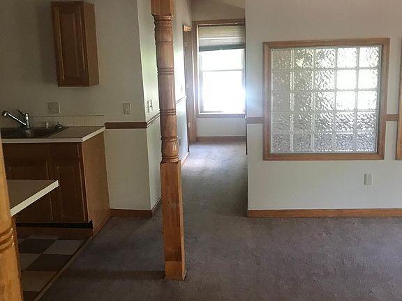 Glass block and exposed pine ceiling