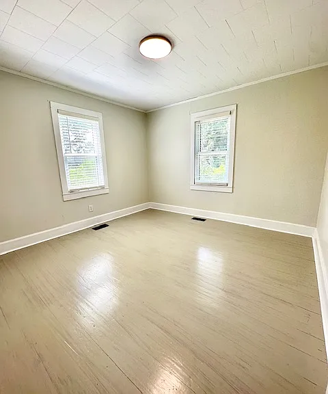Bedroom 2. There is a closet on the left side of the room.
