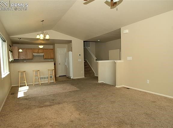large living room, needs new carpet through out. Walls in very good shape.