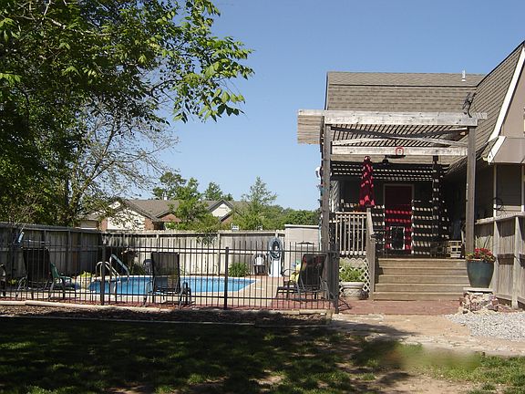 Back yard,pool, deck pergola