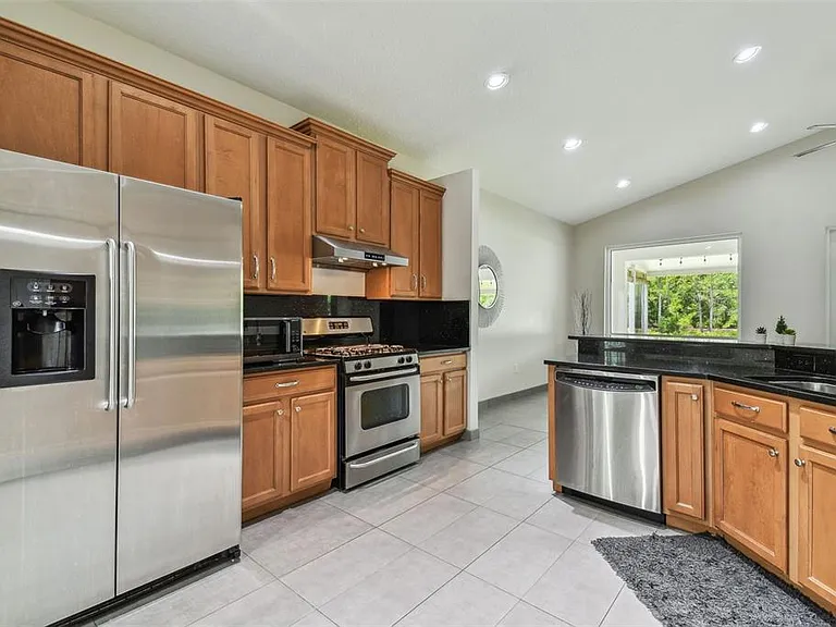 8208 Pinewood Run Ct — Photo 23