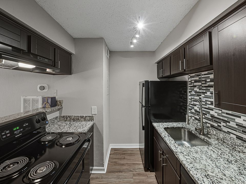 Modern apartment kitchen with updated finishes and appliances