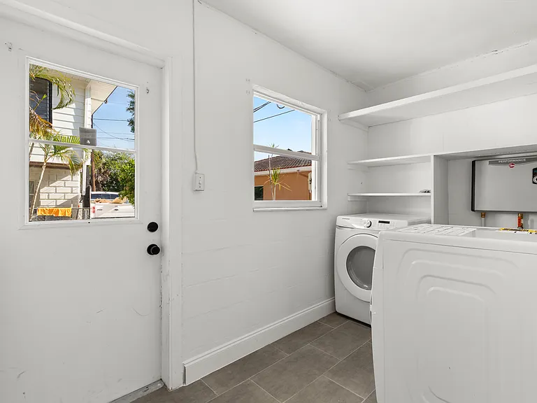 Washer and dryer included in the home.