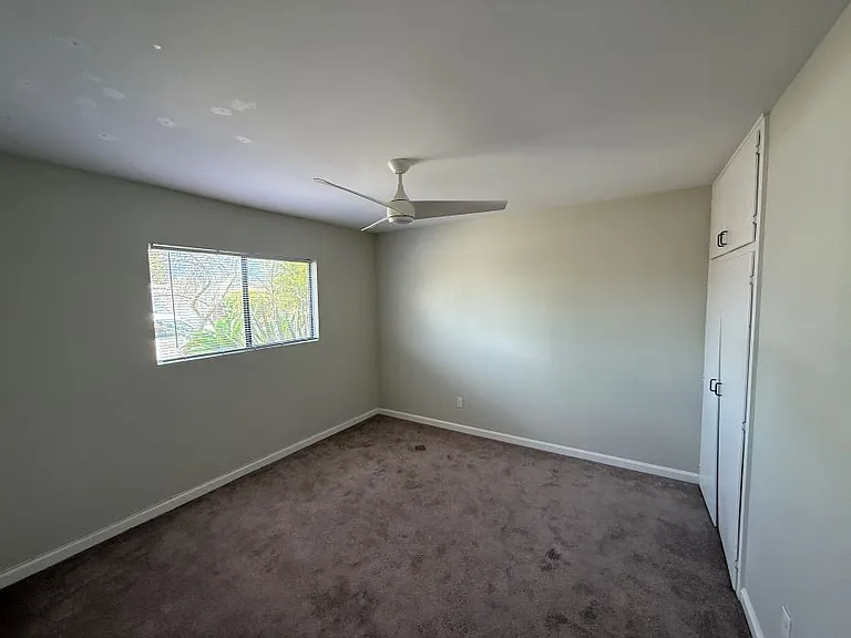 2nd bedroom street side, includes ceiling fan