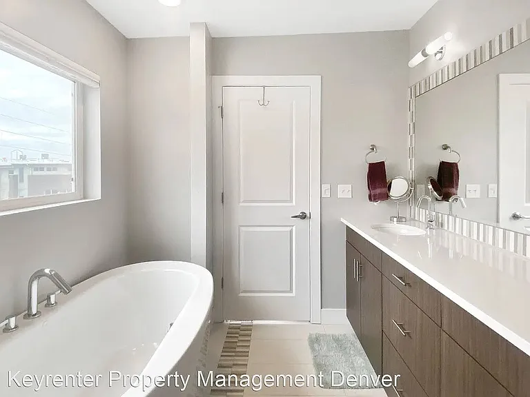 Master bath with bathtub and shower