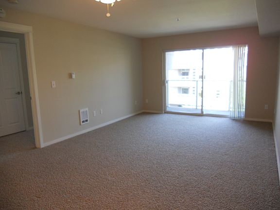 Bright living room w/ private balcony